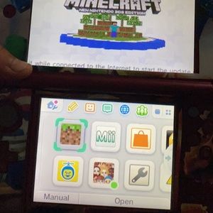 Nintendo 3ds xl with 3 games and storage bag.